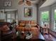 Cozy living room boasts comfortable seating, dark wood floors, and stylish decor at 1635 Southwood Dr., Surfside Beach, SC 29575