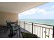 Relax on the oceanfront balcony offering breathtaking views of the beach and ocean activities at 1690 N Waccamaw Dr. # 504, Garden City Beach, SC 29576