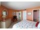 Bedroom with a king bed, nightstands, and view to bathroom at 1690 N Waccamaw Dr. # 504, Garden City Beach, SC 29576