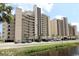 View of the condo with balconies, street and waterway at 1690 N Waccamaw Dr. # 504, Garden City Beach, SC 29576