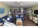 This open concept living space flows into the kitchen, creating an ideal space for entertaining and relaxing at 1690 N Waccamaw Dr. # 504, Garden City Beach, SC 29576