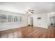 Bedroom features hardwood floors, neutral walls, ceiling fan, and natural light at 1700 Longleaf Dr., Myrtle Beach, SC 29575