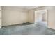 Unfurnished room with dirty carpet and an open doorway at 1700 Longleaf Dr., Myrtle Beach, SC 29575