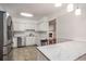 Bright kitchen features stainless steel appliances, white cabinets, and marble countertops at 1700 Longleaf Dr., Myrtle Beach, SC 29575