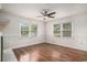 Comfortable living area with hardwood floors, a ceiling fan and multiple windows at 1700 Longleaf Dr., Myrtle Beach, SC 29575