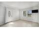 Inviting living room with a decorative front door and ample natural light at 1700 Longleaf Dr., Myrtle Beach, SC 29575