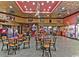 Recreational area with vintage arcade games, tables, and colorful tiki decor at 201 74Th Ave N Ocean Blvd. # 2627, Myrtle Beach, SC 29572