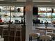 Well-lit bar featuring liquor displays, counter seating, and modern decor at 201 74Th Ave N Ocean Blvd. # 2627, Myrtle Beach, SC 29572