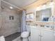 Tiled bathroom featuring a shower, toilet, vanity, and medicine cabinet at 201 74Th Ave N Ocean Blvd. # 2627, Myrtle Beach, SC 29572