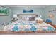 Inviting bedroom featuring a beach-themed design with a queen bed, side tables, and decorative elements at 201 74Th Ave N Ocean Blvd. # 2627, Myrtle Beach, SC 29572