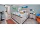 Cozy bedroom with a queen-size bed, coastal decor, and access to the balcony at 201 74Th Ave N Ocean Blvd. # 2627, Myrtle Beach, SC 29572