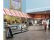 Charming dessert shop featuring ice cream, candies, pastries, and colorful awnings at 201 74Th Ave N Ocean Blvd. # 2627, Myrtle Beach, SC 29572