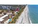 Aerial view of beachfront condo, oceanfront beach access, parking and outdoor lounge areas at 201 76Th Ave. N # D-3, Myrtle Beach, SC 29572