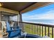 Relax on the balcony with ocean views; featuring comfortable seating and clear views of the beach and ocean at 201 76Th Ave. N # D-3, Myrtle Beach, SC 29572