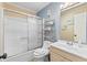 Inviting bathroom features a tub with shower, vanity, and ample storage at 201 76Th Ave. N # D-3, Myrtle Beach, SC 29572