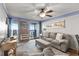 Inviting living room featuring a comfortable couch and balcony access with an ocean view at 201 76Th Ave. N # D-3, Myrtle Beach, SC 29572