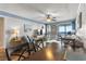 Bright living room with a view of the kitchen, seating area, and access to the balcony at 201 76Th Ave. N # D-3, Myrtle Beach, SC 29572