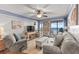 Relaxing living room with a plush seating area and scenic views from the balcony at 201 76Th Ave. N # D-3, Myrtle Beach, SC 29572