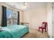 Cozy bedroom featuring a colorful bedspread and chair at 2060 Woodburn Dr., Myrtle Beach, SC 29579