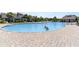 Large outdoor community pool with ample seating and lounging areas at 2060 Woodburn Dr., Myrtle Beach, SC 29579