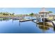 Community boat dock on the lake with covered seating area at 2060 Woodburn Dr., Myrtle Beach, SC 29579