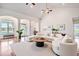 Bright living room featuring hardwood floors, high ceilings, and neutral décor, creating a welcoming space at 2060 Woodburn Dr., Myrtle Beach, SC 29579