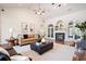 Sophisticated living room featuring a fireplace, high ceilings, and hardwood floors at 2060 Woodburn Dr., Myrtle Beach, SC 29579
