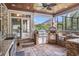 Outdoor kitchen with stainless steel grill, pizza oven, granite counters, and brick accents at 2060 Woodburn Dr., Myrtle Beach, SC 29579