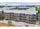 Low-rise condos with screened balconies nestled in a coastal community, offering a serene living environment at 207 N Ocean Blvd. # 342, North Myrtle Beach, SC 29582