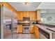 Bright kitchen with stainless steel appliances and ample cabinet space at 207 N Ocean Blvd. # 342, North Myrtle Beach, SC 29582