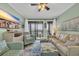 Comfortable living room with sliding door access to the balcony and beach views at 207 N Ocean Blvd. # 342, North Myrtle Beach, SC 29582