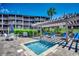 Outdoor hot tub and lounge chairs near the community pool at 207 N Ocean Blvd. # 342, North Myrtle Beach, SC 29582
