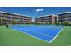 Well-maintained tennis courts surrounded by lush greenery, offering a great space for recreational activities at 207 N Ocean Blvd. # 342, North Myrtle Beach, SC 29582