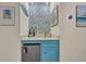 Chic wet bar with beverage refrigerator and elegant decor, perfect for entertaining at 207 N Ocean Blvd. # 342, North Myrtle Beach, SC 29582