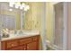 Well-lit bathroom featuring a vanity, mirror, and a step-in shower at 211 76Th Ave. N # A3, Myrtle Beach, SC 29572