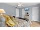Cozy bedroom features a TV and ample storage in a wicker dresser for a relaxing retreat at 211 76Th Ave. N # A3, Myrtle Beach, SC 29572