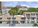 Multiple exterior units showcasing private balconies and lush courtyard landscaping at 211 76Th Ave. N # A3, Myrtle Beach, SC 29572