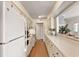 Efficient kitchen offering ample cabinet space, modern appliances, and a convenient pass-through window at 211 76Th Ave. N # A3, Myrtle Beach, SC 29572