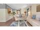 Cozy living area with comfortable sofas, a stylish rug, and a view into the open kitchen at 211 76Th Ave. N # A3, Myrtle Beach, SC 29572
