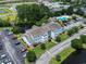 Aerial view of community featuring ponds, trees, and a swimming pool at 2280 Andover Dr. # C, Surfside Beach, SC 29575