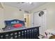 This cozy bedroom features a dark wood bed frame and bright walls at 2280 Andover Dr. # C, Surfside Beach, SC 29575