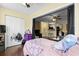 Bedroom boasts hardwood floors and an open concept view to living area and kitchen at 2280 Andover Dr. # C, Surfside Beach, SC 29575