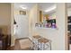 Inviting home entrance featuring a cozy breakfast bar and white door creating a welcoming ambiance at 2280 Andover Dr. # C, Surfside Beach, SC 29575