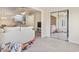 Open-concept living space with neutral tones and sliding mirror closet doors at 2280 Andover Dr. # L, Surfside Beach, SC 29575