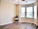 Bedroom with wooden floors and a bay window overlooking the outdoors at 230 Vermillion Dr., Little River, SC 29566