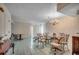 Dining room featuring tile floors, chandelier, and a dining table with chairs at 2309 Withers Dr. # 4, Myrtle Beach, SC 29577