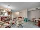 Living area showing tile floors, a chandelier, and a view into the kitchen and hallway at 2309 Withers Dr. # 4, Myrtle Beach, SC 29577