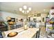 Open dining area with stylish decor, seamlessly connecting to the modern kitchen at 234 Rolling Woods Ct., Little River, SC 29566