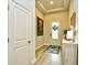 Bright foyer with decorative lighting, hard wood flooring, and a stylish rug at 234 Rolling Woods Ct., Little River, SC 29566