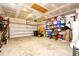 Spacious garage with overhead door and ample room for storage, tools, and more at 234 Rolling Woods Ct., Little River, SC 29566